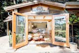 Interior designer Eva Holbrook and artist Jamie Williams brought this cozy mountain retreat back to life by embracing an "uncluttered simplicity" design concept. They brought the outdoors in by incorporating wood elements, big windows, and reclaimed materials.