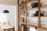 The couple removed the doors off the cupboards to create open shelving and display her collection of tableware.  Photo 4 of 13 in My House: Amid a Pandemic, a Restaurateur Rebuilds Her Career and Life in Oakland