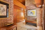 The home is made up of two signature Frank Lloyd Wright building materials—Chicago common brick and tidewater cypress, which he used often for their durability and minimal need for an artificial finish.