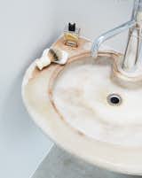In the main bathroom, Tom sourced an old water fountain basin from a park in Philadelphia.