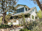 The facade of the home, while updated with new lap siding, embodies the craftsman style of its original iteration.  Photo 1 of 8 in Artist John Baldessari’s Craftsman-Style Home in Santa Monica Asks $3.9M