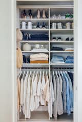 "Our primary closet measures just three feet by six feet, so we worked with California Closets to install floor to ceiling shelves that could store and display our entire wardrobes. We also added vertical storage to our daughter’s closet which enabled us to tuck away our luggage and sentimental items safely out of sight. Instead of feeling cramped, or space challenged, we are thrilled with how perfectly everything fits, and how streamlined our space feels."