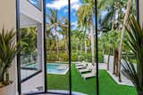 In Miami, a Palm Tree-Surrounded Home a Block From the Bay Asks $5.5M - Photo 4 of 10 - 
