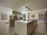 A Contemporary Villa in Belgium Comes Complete With a Landscape Pond and Showroom Garage - Photo 4 of 15 -