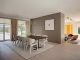 A Contemporary Villa in Belgium Comes Complete With a Landscape Pond and Showroom Garage - Photo 6 of 15 -