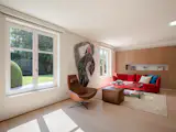 A Contemporary Villa in Belgium Comes Complete With a Landscape Pond and Showroom Garage - Photo 7 of 15 -