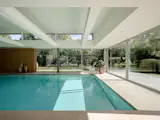 A Contemporary Villa in Belgium Comes Complete With a Landscape Pond and Showroom Garage - Photo 11 of 15 -