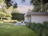 A Contemporary Villa in Belgium Comes Complete With a Landscape Pond and Showroom Garage - Photo 13 of 15 -