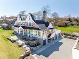 A Charming Coastal Retreat in Jamestown Village Seeks $6M