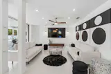 An Archetypal Sarasota School Home Nestled in Siesta Key Asks $3.3M - Photo 4 of 8 - 