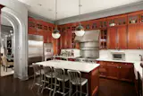 This $7.7M Classic Chicago Home Made of Limestone and Brick Hides a Striking Sunroom - Photo 5 of 8 - 