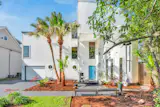 Every Story in This $1.9M Lake Pontchartrain Home Comes Framed in Glass