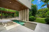 The Living Room Flows into Palms in This $5.5M Miami Home - Photo 8 of 8 - 