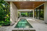 The Living Room Flows into Palms in This $5.5M Miami Home - Photo 7 of 8 - 