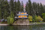 Lake Coeur D’Alene’s  Iconic “House on a Rock” Lists for $9.5M