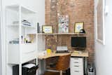Office, Study Room Type, Chair, Bookcase, Storage, Shelves, Desk, and Medium Hardwood Floor  Photo 9 of 9 in The Urban Midcentury Brownstone by Claudia Steer