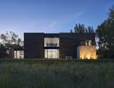 PLaN Architecture designed this home to create connections and separations from the outlying prairie of South Dakota. The plan was to craft spaces that would be open and inviting, and others that would be secluded and private, despite the flat landscape.