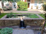 Graywater system is used for garden irrigation, and water features, spring 2018.