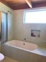 Soaking tub in full bathroom.