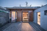 Outdoor, Small Patio, Porch, Deck, Pavers Patio, Porch, Deck, and Back Yard  Photo 8 of 12 in A Smart TV Controls the Layout of This Futuristic Beijing Home
