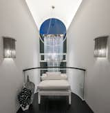 Triple vaulted hallway with crystal chandelier