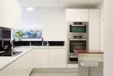 White, gloss, handless kitchen
