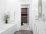 Bath, Porcelain Tile, Undermount, Alcove, Wall, Undermount, Ceramic Tile, Whirlpool, and Marble  Bath Alcove Porcelain Tile Whirlpool Ceramic Tile Marble Photos from Eastwood Residence