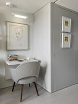 A home office is nestled into a small nook of the residence.