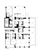 The plans of the two apartments that were to be combined into one residence featured many thickened walls that concealed an overabundance of immovable plumbing, mechanical, and structural elements. These constraints forced the development of a series of innovative layout strategies.