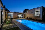 Outdoor, Hanging Lighting, Stone Patio, Porch, Deck, Concrete Patio, Porch, Deck, Lap Pools, Tubs, Shower, Hardscapes, Back Yard, and Swimming Pools, Tubs, Shower  Photo 15 of 15 in Koser II by Neumann Monson Architects