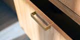 Detail of custom brass drawer pull. 