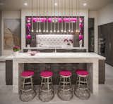The kitchens are designed as entertaining spaces with appliances hidden within sleek cabinetry.