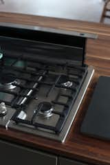 Bosch cooktop with Broan downdraft in kitchen island.