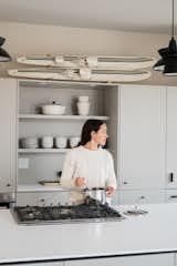 Kitchen, Wall Oven, Refrigerator, Cooktops, Undermount Sink, Pendant Lighting, and Concrete Floor Kitchen view with Hygge Supply cabinets.  Photo 4 of 21 in North Shore #7 by Hygge Supply