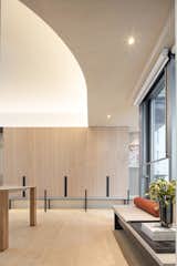 The custom-made cabinet wall with white washed oak panels and charcoal grey metal detail, resting in front of a striped backdrop. #studioadjective @studioadjective #apartment #home