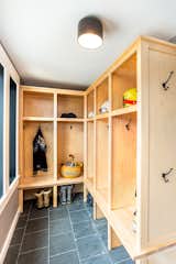 Storage Room, Shelves Storage Type, and Cabinet Storage Type Mudroom Room Cubbies  Photo 7 of 14 in Ski in/ Ski Out Row House by Mary Beth Childs