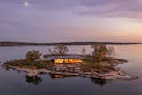 Exterior, House Building Type, Concrete Siding Material, and Flat RoofLine The private island is situated in the Thousand Islands archipelago.  Photo 6 of 12 in CONTEMPORARY ISLAND HOUSE I by Taylored Architecture