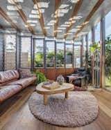 
The fully operable glass inner skin of the home is inset from the outer punctuated masonry façade, providing an abundance of light and outlook whilst maintaining privacy from the public realm. 
