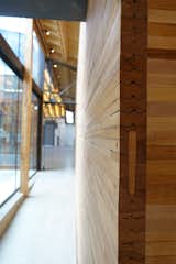 walls made from reclaimed boxcar flooring