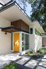 Exterior, House Building Type, Mid-Century Building Type, Metal Roof Material, Stone Siding Material, Stucco Siding Material, Shed RoofLine, and Wood Siding Material  Photo 16 of 20 in Barton Hills Residence by Brett Grinkmeyer