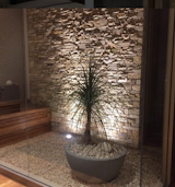 outdoors within the house in the upper level of the house