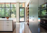 Kitchen, Engineered Quartz, White, Wood, Concrete, Recessed, Ceiling, Refrigerator, Wall Oven, and Microwave  Kitchen Recessed Wall Oven Wood Concrete Refrigerator White Photos from Open House