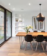 Dining Room, Shelves, Recessed Lighting, Pendant Lighting, Chair, Medium Hardwood Floor, and Table  Photos from Hibou House