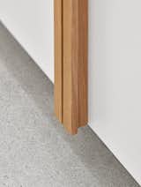 Custom-designed solid white oak pulls provided a tactile warmth when exposed to the touch.