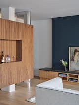 Living Room, Light Hardwood Floor, Sofa, and Storage  Photo 6 of 11 in Hazel Flat by Barbora Vokac Taylor Architect