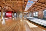 Dining Room, Ceiling Lighting, and Light Hardwood Floor Dining Area or Entertainment Stage  Photo 5 of 14 in The American Bag Building Loft by Andy Read - Corcoran
