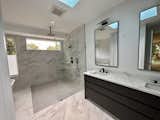 Luxurious main bathroom with in-shower tub
