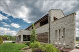 Exterior, Wood Siding Material, House Building Type, and Stone Siding Material  Photo 6 of 21 in Rock House by 33bY Architecture