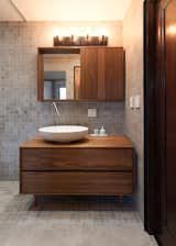 Bath Room, Wood Counter, Porcelain Tile Floor, Wall Lighting, Porcelain Tile Wall, and Vessel Sink Bathroom  Photos from Stuyvesant Townhouse