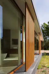 Villa H | Wooden Brise-soleils provide shade and privacy